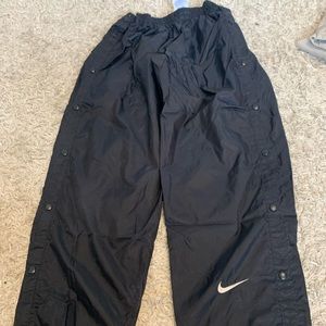Black Nike tear away pants, great condition